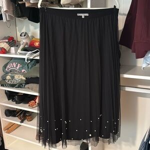 Black pleated skirt with pearl embellishments